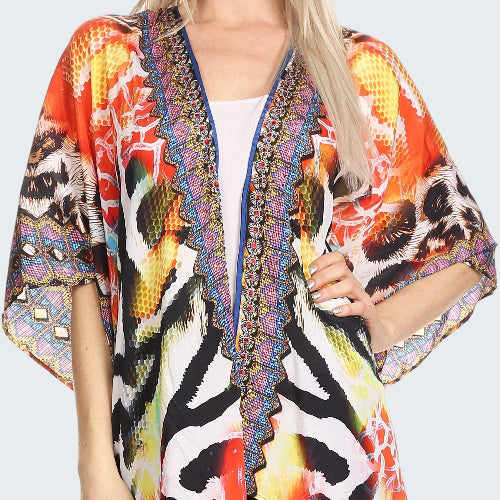 Colorful patterned kimono over a plain background
