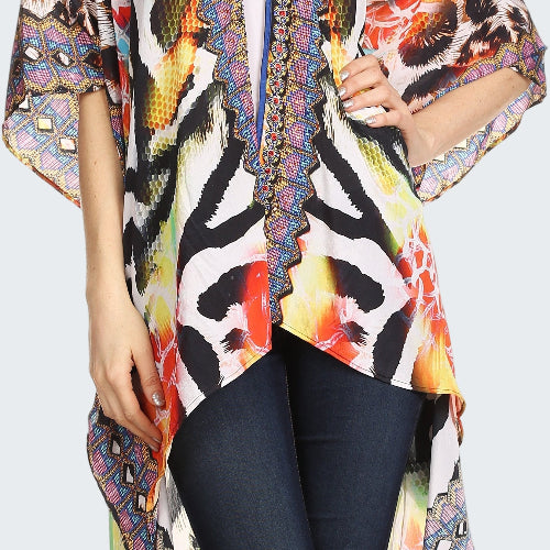 Colorful patterned kimono over a plain background