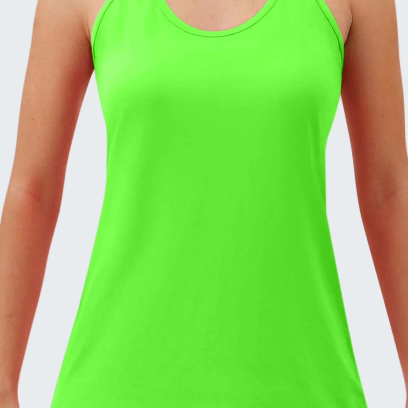 Neon green tank top worn by a person on a white background