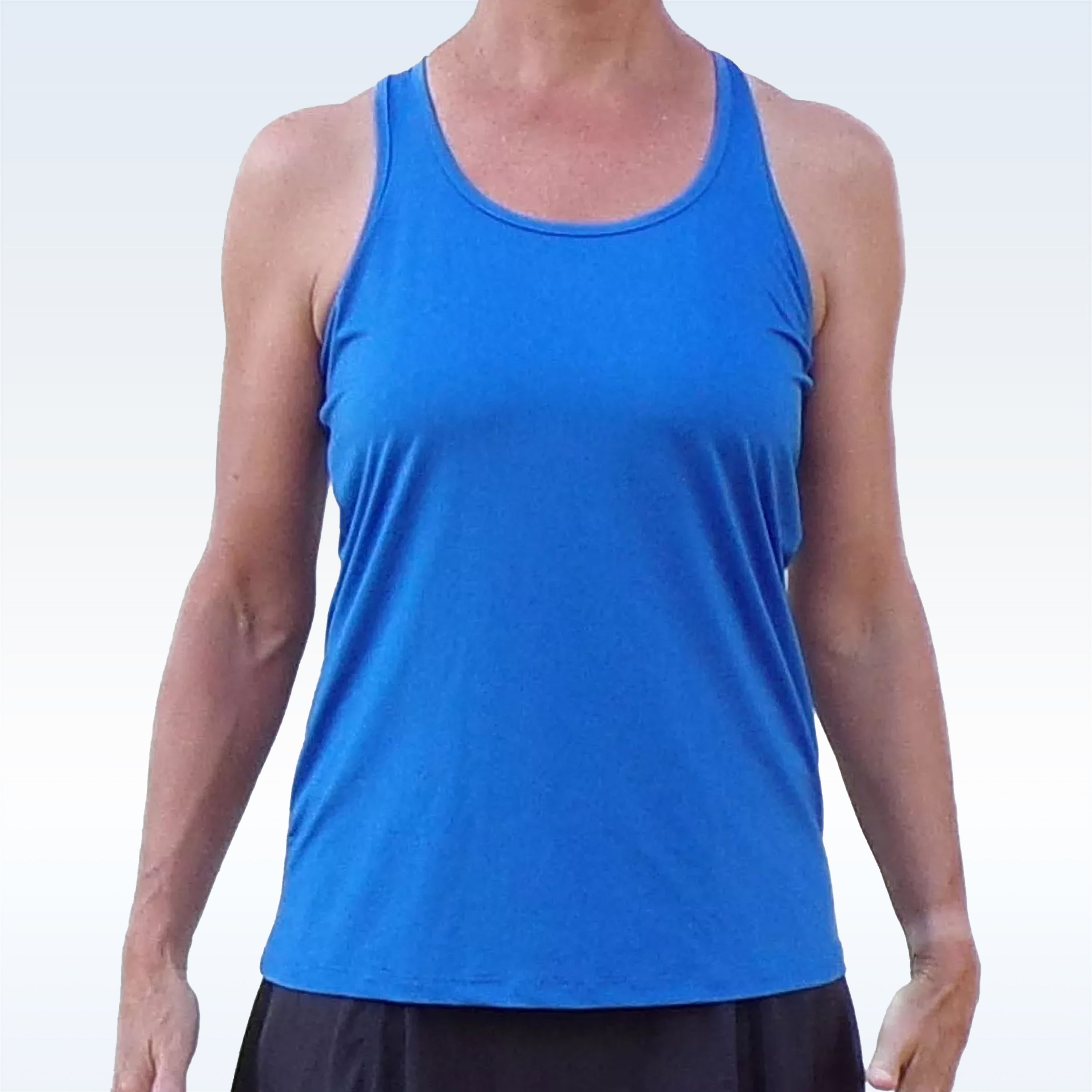 Person wearing a blue tank top against a white background
