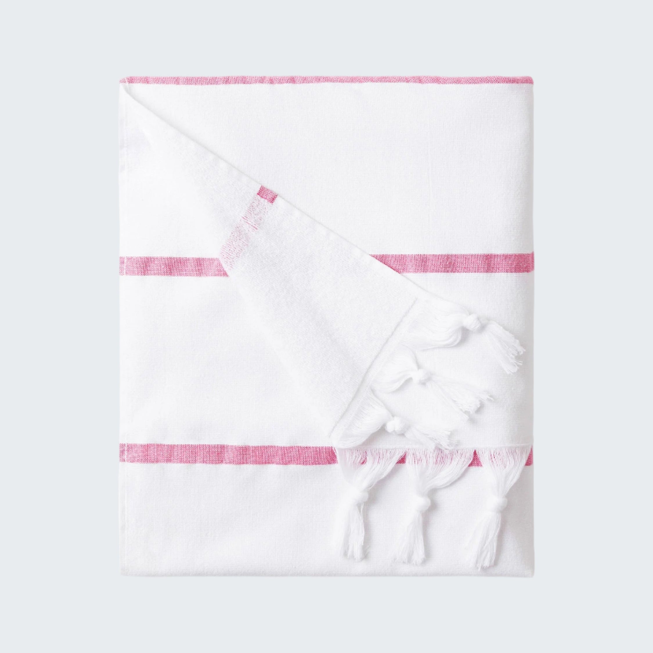 White towel with pink stripes on a white background