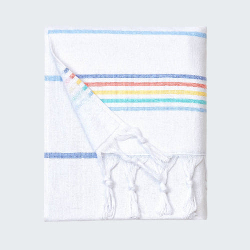 Folded towel with rainbow stripes on a white background