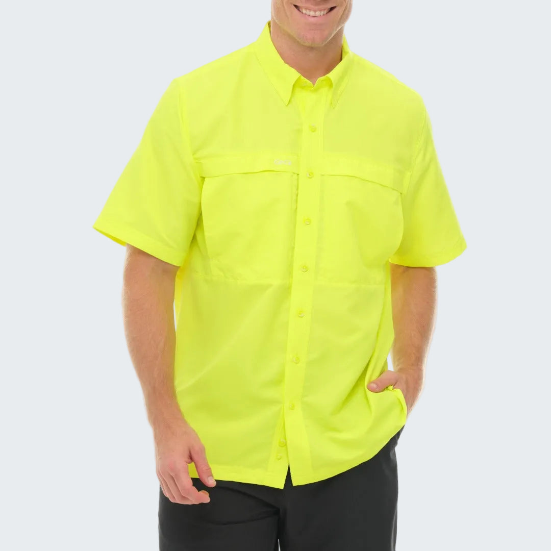 Person wearing a bright yellow shirt on a white background