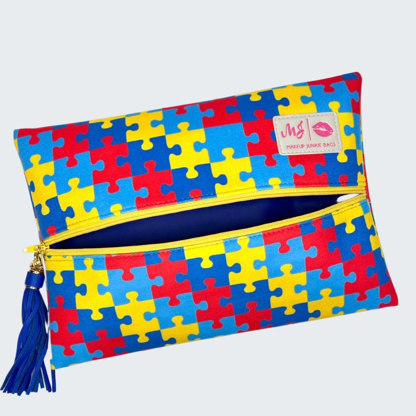 Pouch with puzzle pattern and visible brand logo on a white background