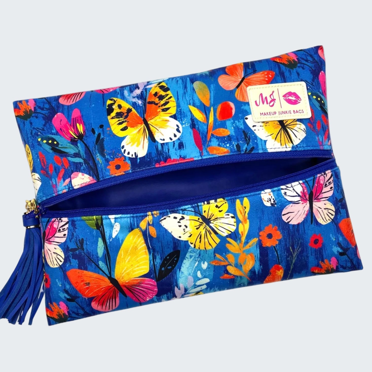 Colorful butterfly-patterned pouch with a visible brand label on a white background