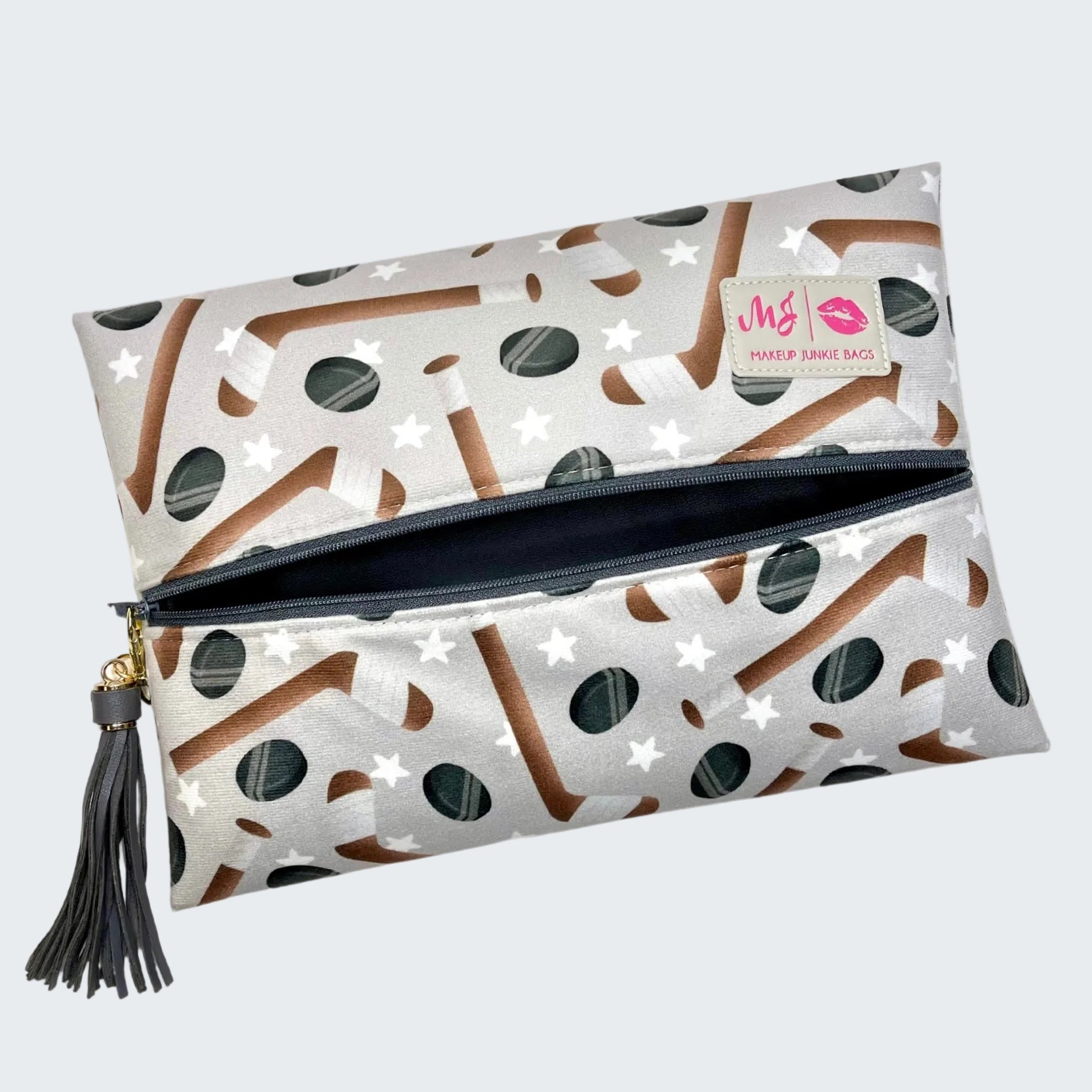 Makeup bag with star and boot pattern on a white background