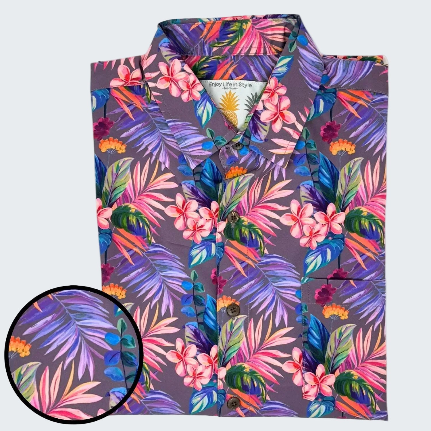 Colorful floral patterned shirt with a close-up detail on a white background