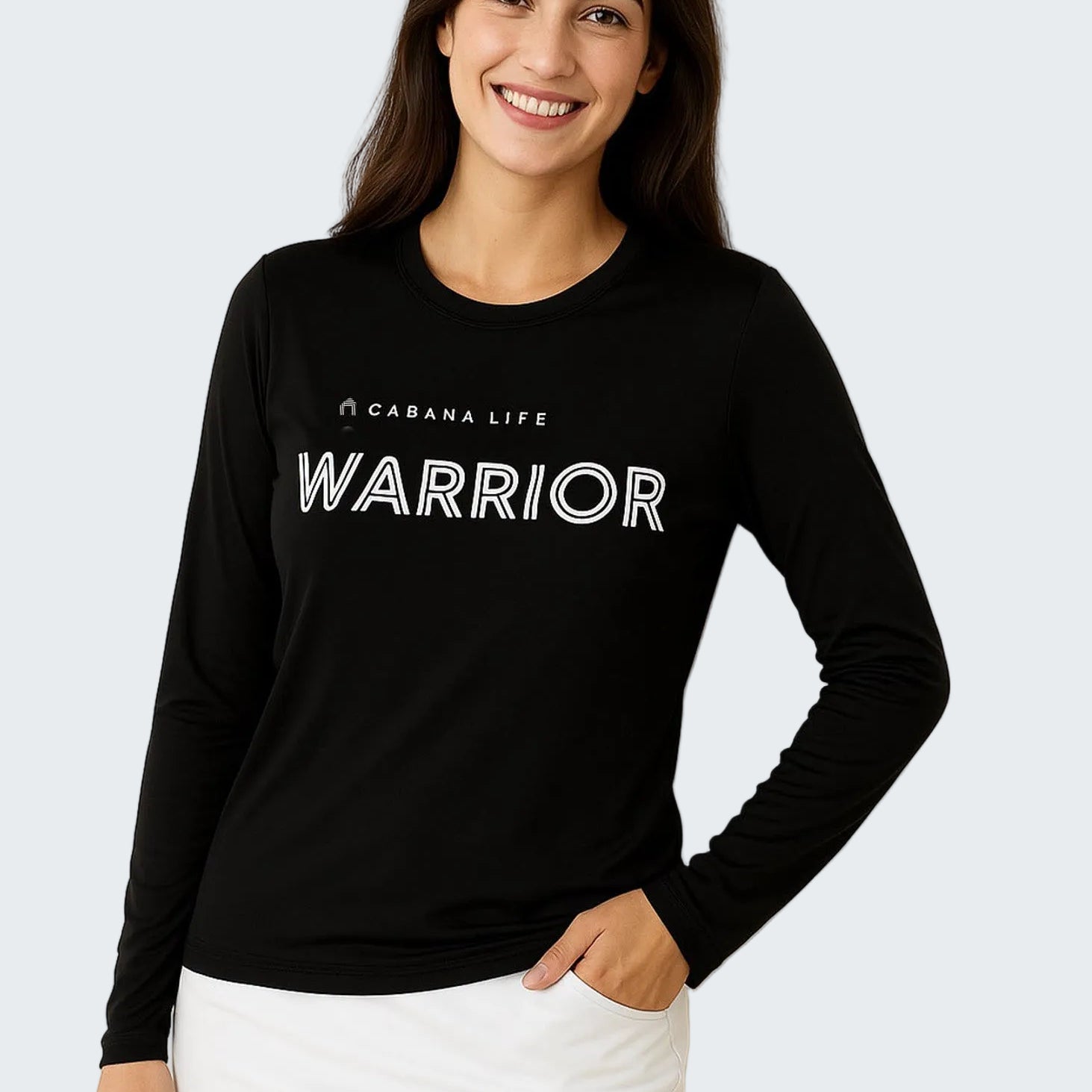 Woman wearing a black long-sleeve shirt with 'Warrior' text on a white background