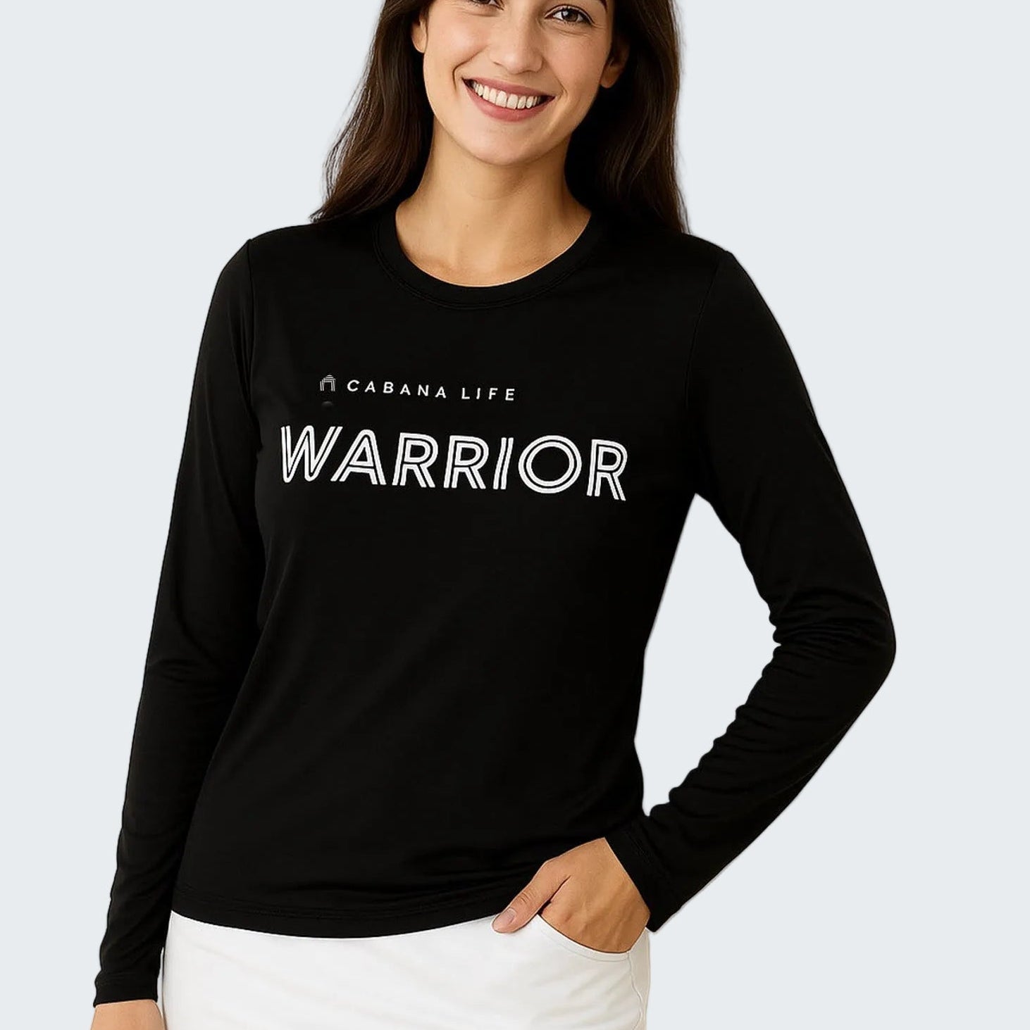 Woman wearing a black long-sleeve shirt with 'Warrior' text on a white background