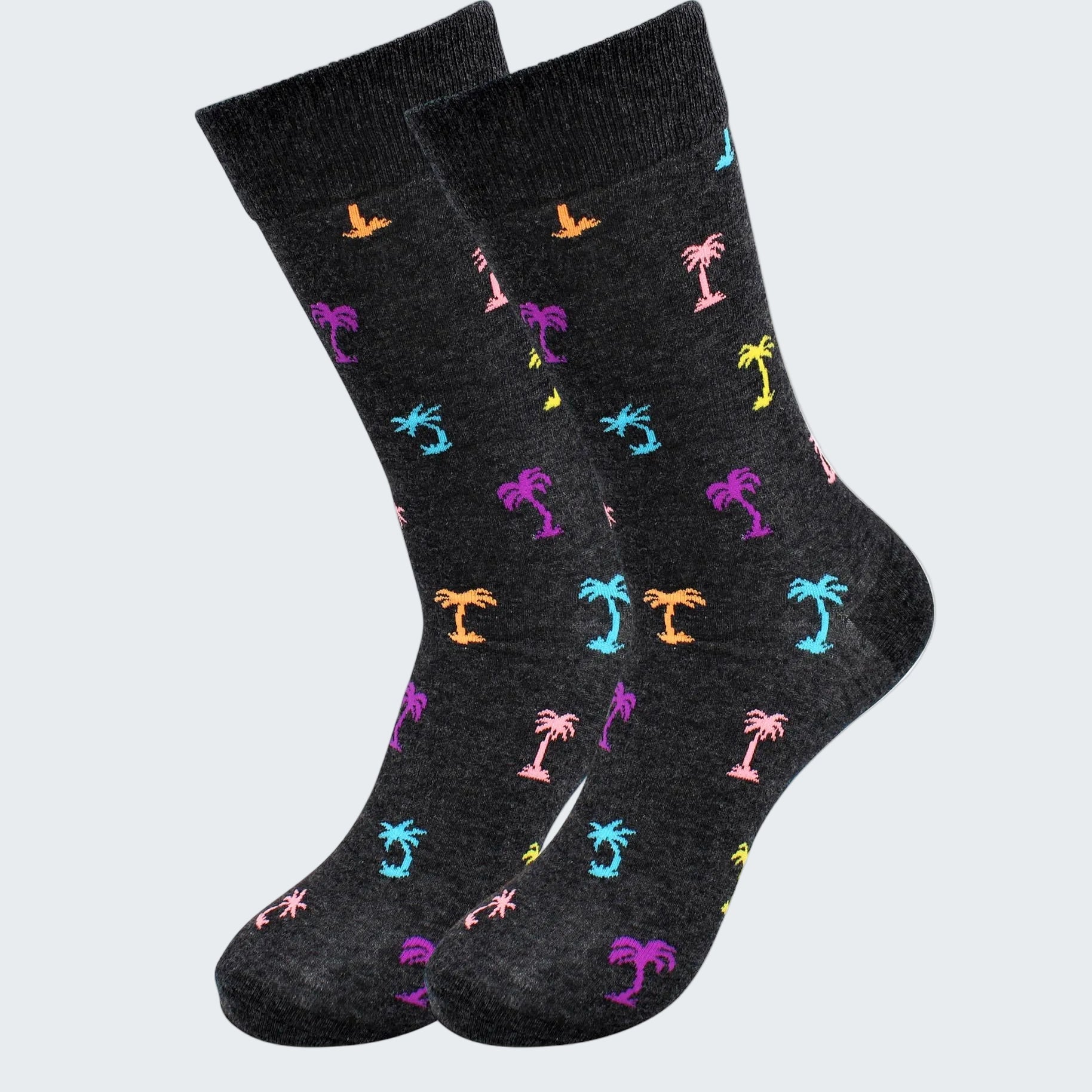 Black socks with colorful palm tree pattern on a white background