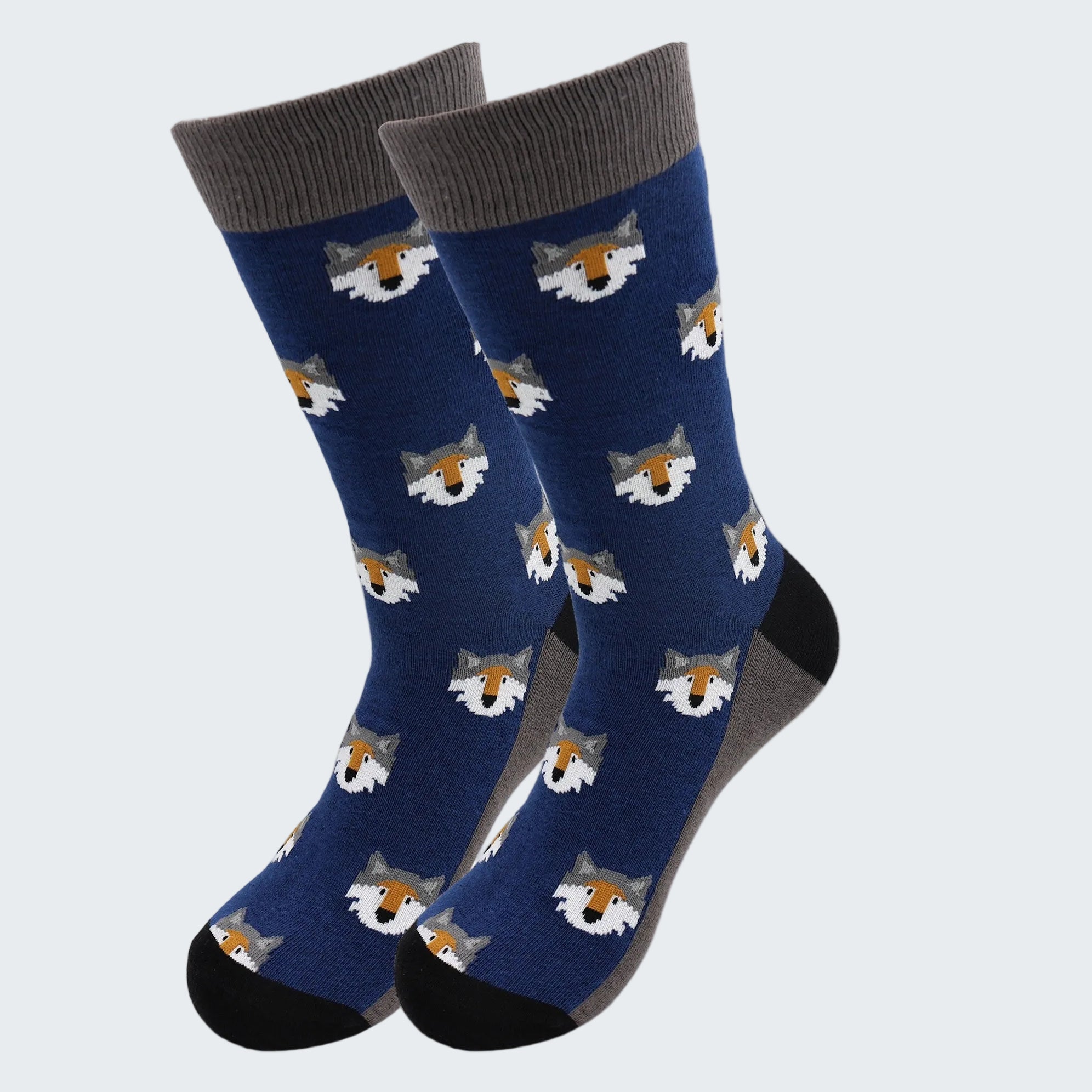 Pair of blue socks with fox pattern on a white background