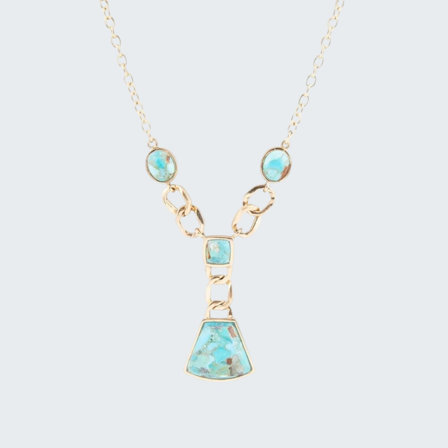 Necklace with turquoise stones on a white background