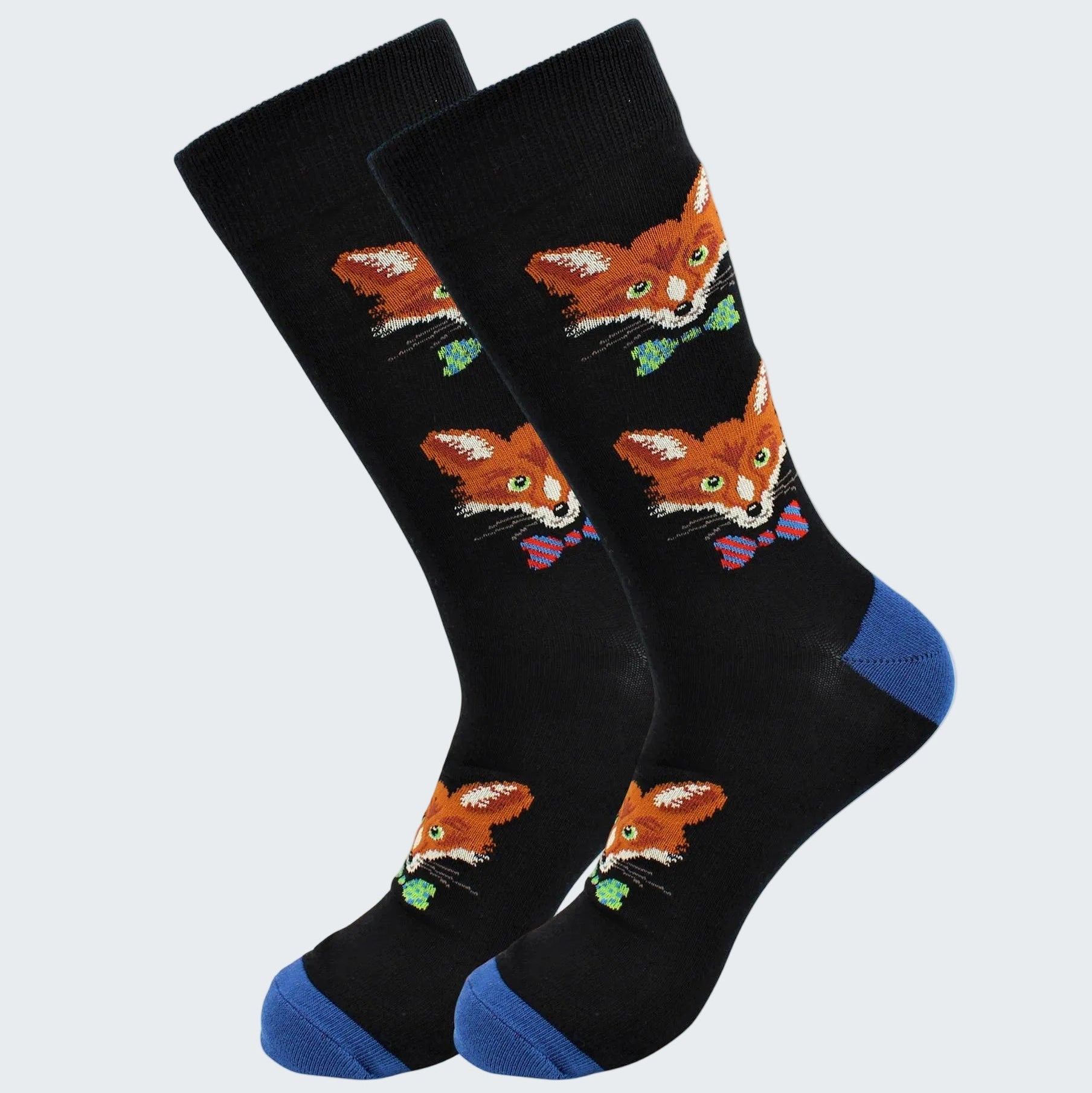 Black socks with fox designs and blue toes on a white background