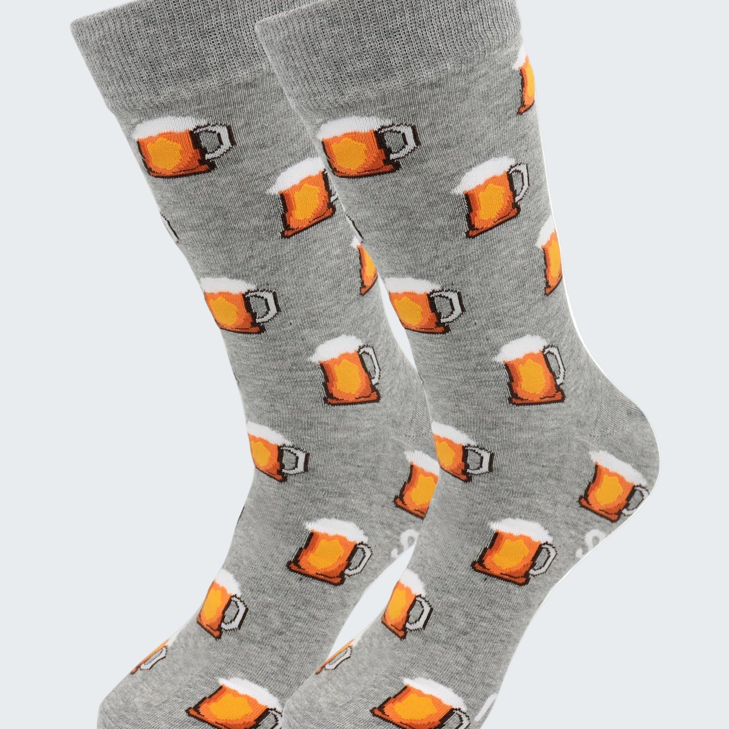 Gray socks with beer mug pattern on a white background