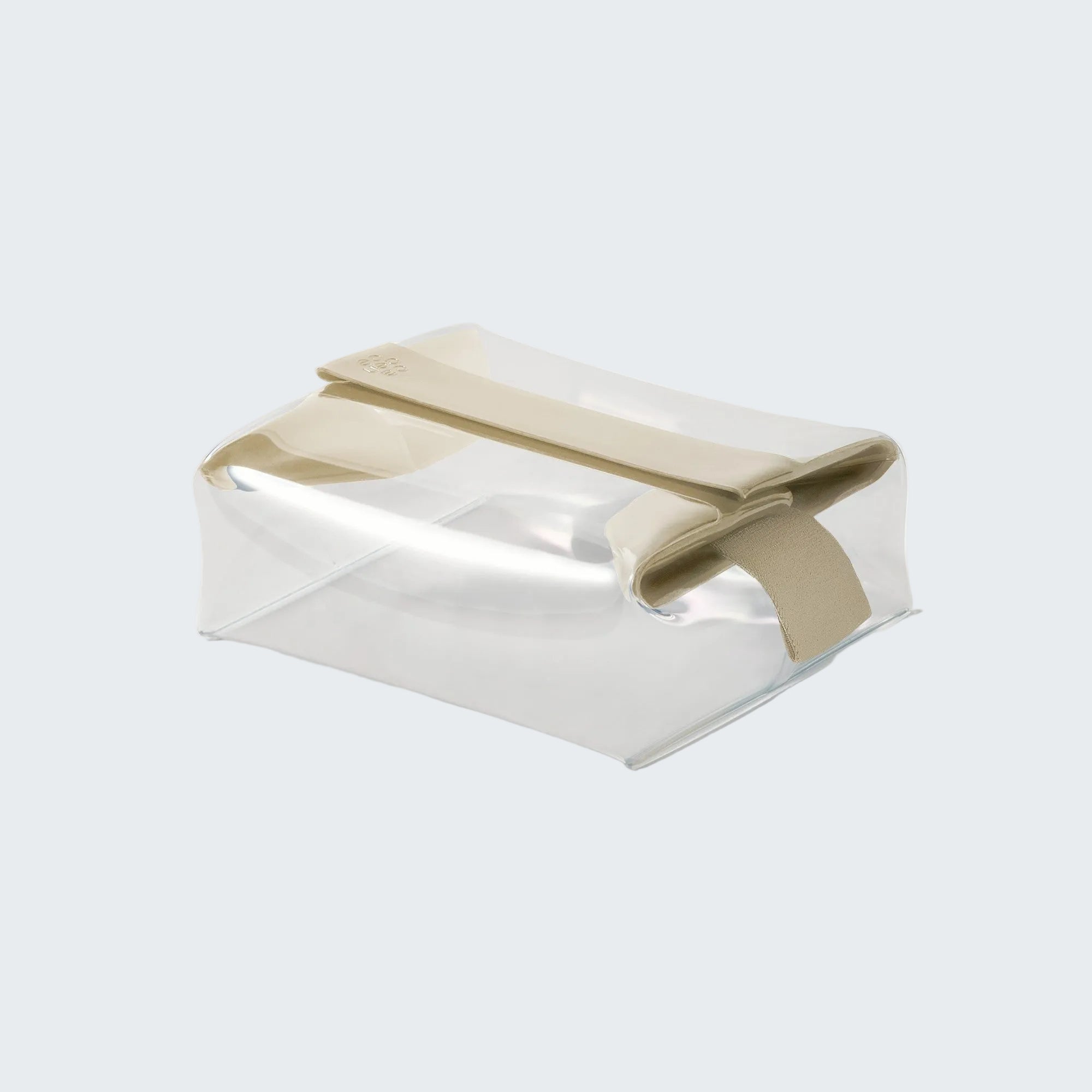 Clear rectangular box with a beige ribbon on a white background