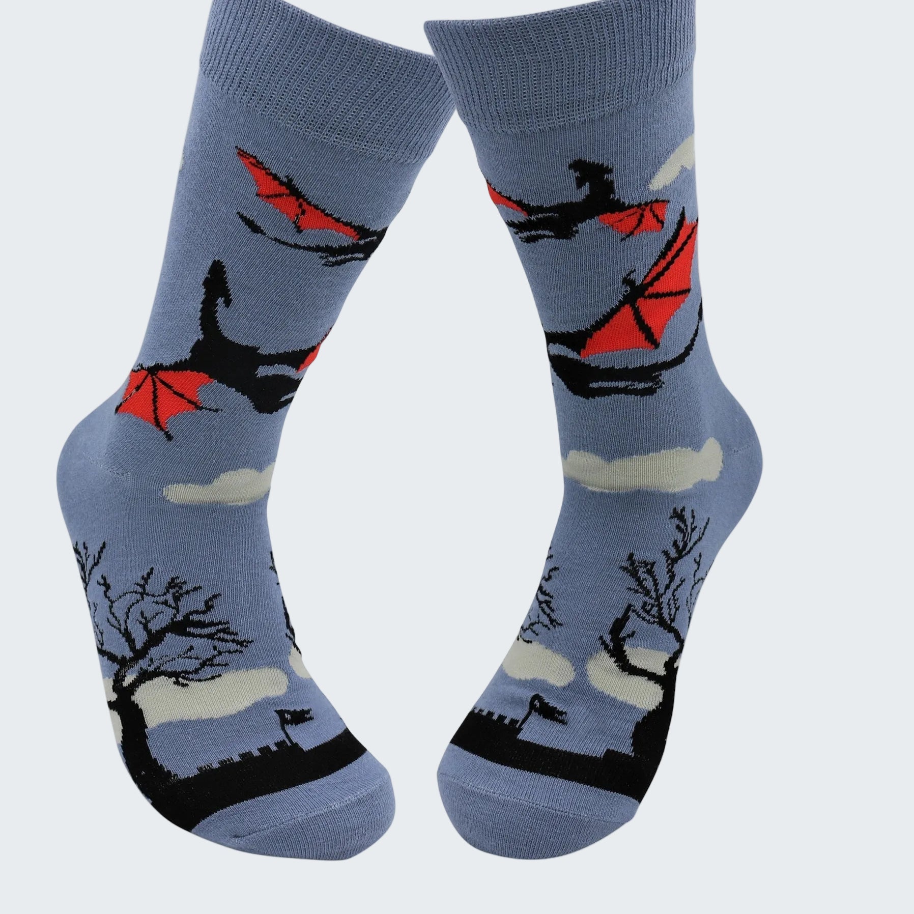 Blue socks with black and red airplane design on a white background