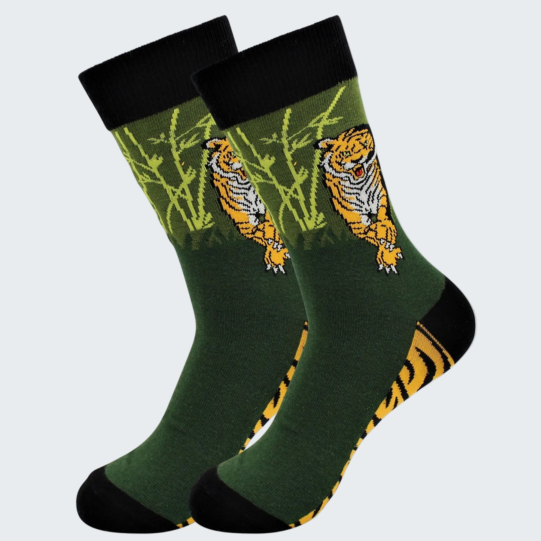 Green socks with tiger design on a white background