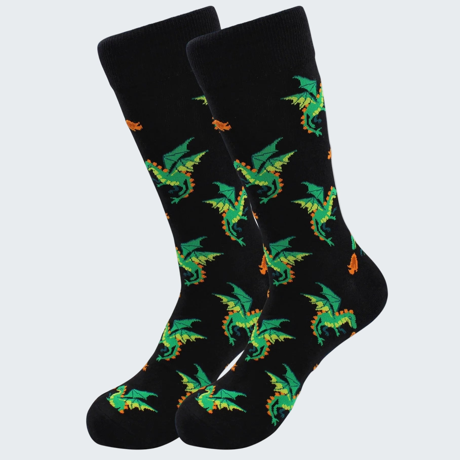 Black socks with green dragon pattern on a white background