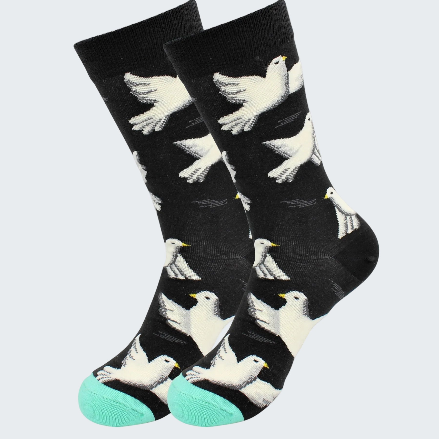 Black socks with white bird pattern on a white background