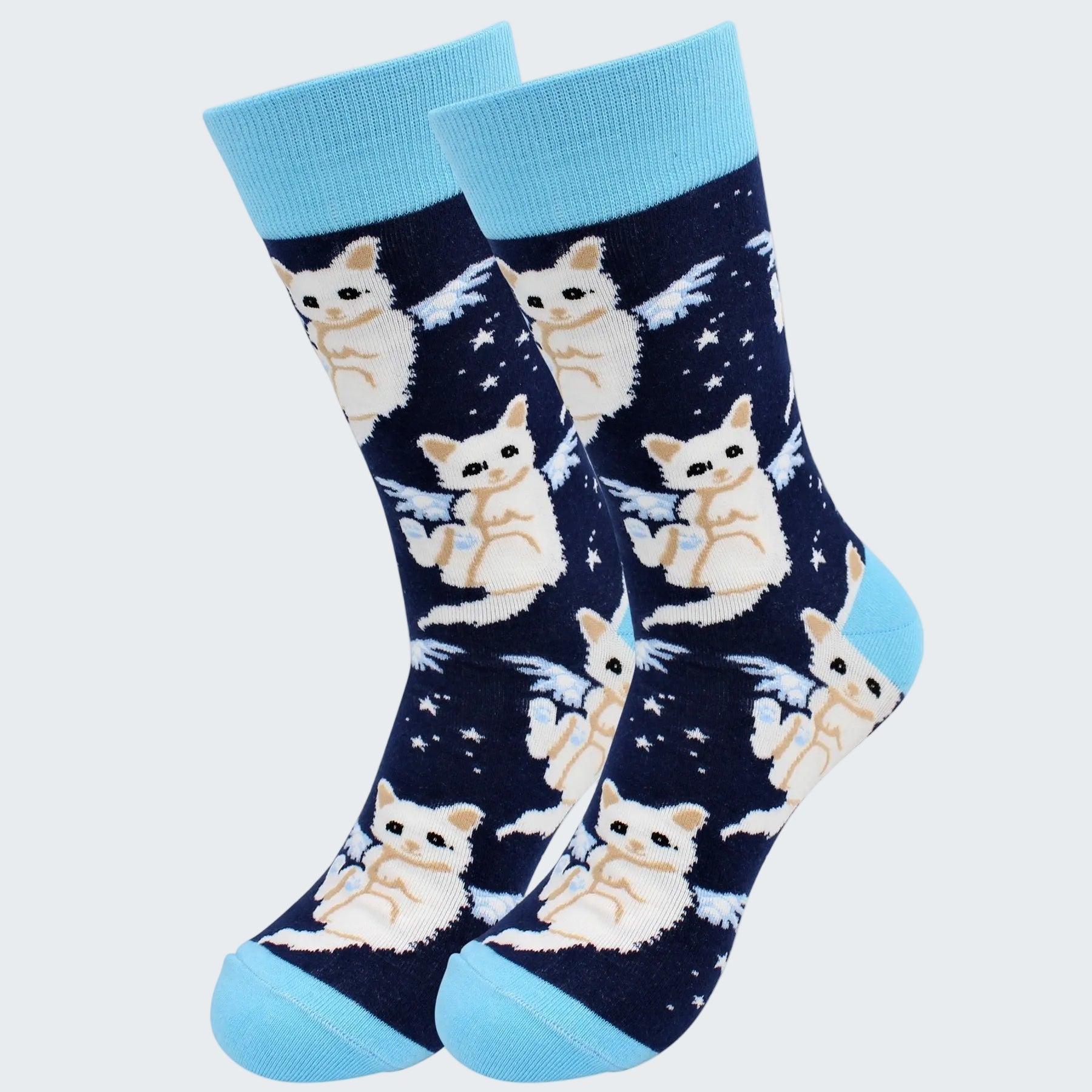 Navy socks with white cat pattern and light blue toes and cuffs on a white background