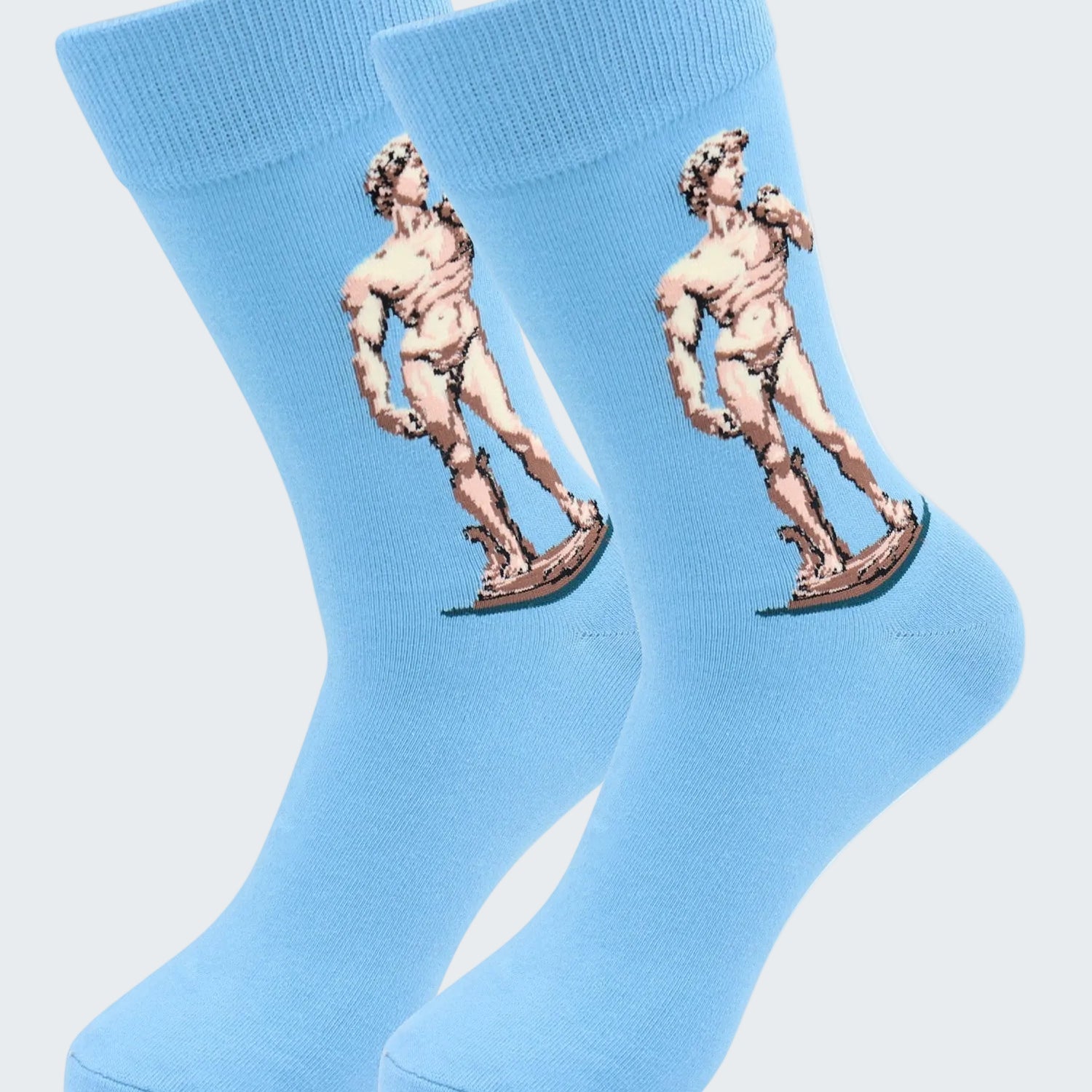 Light blue socks with a statue design on a white background