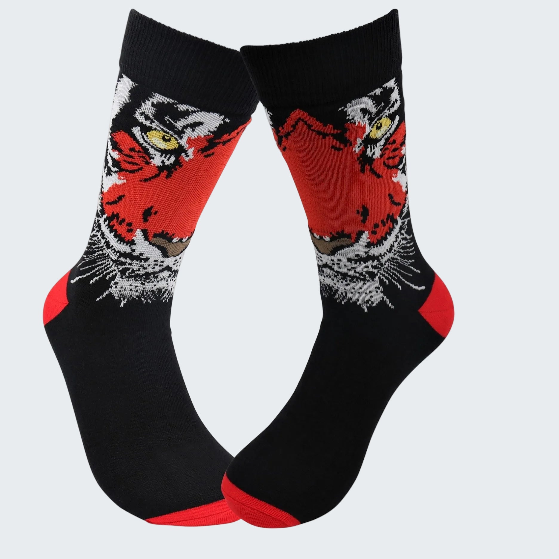 Black socks with red and white tiger design on a white background