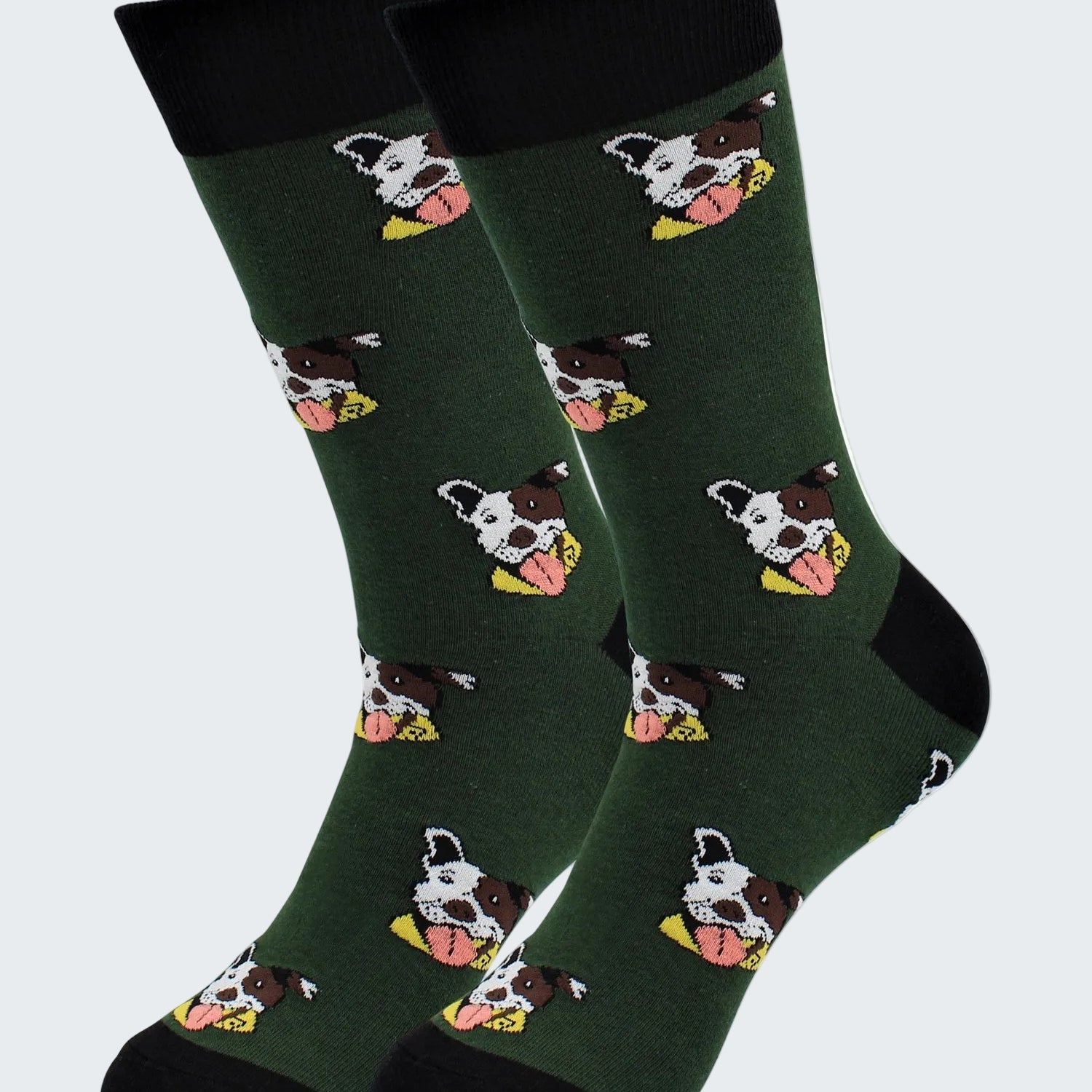 Green socks with cow pattern on a white background