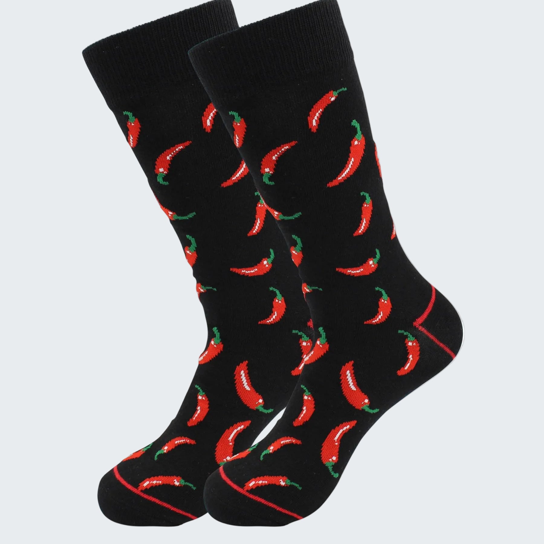Black socks with red chili pepper pattern on a white background