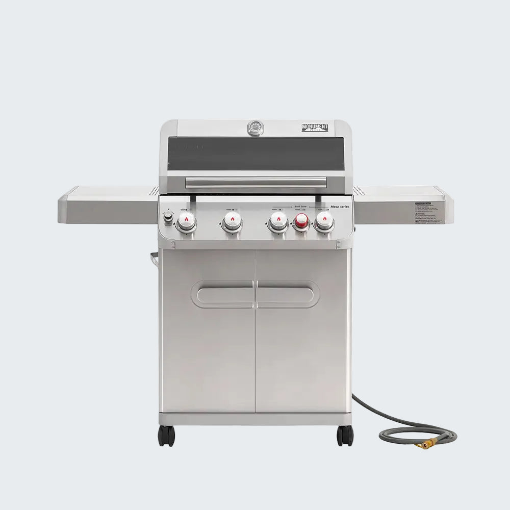 Stainless steel grill with four burners on a white background