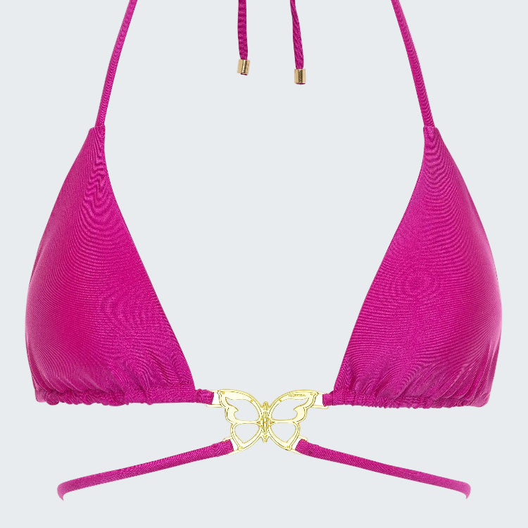 Pink bikini top with gold butterfly detail on a white background
