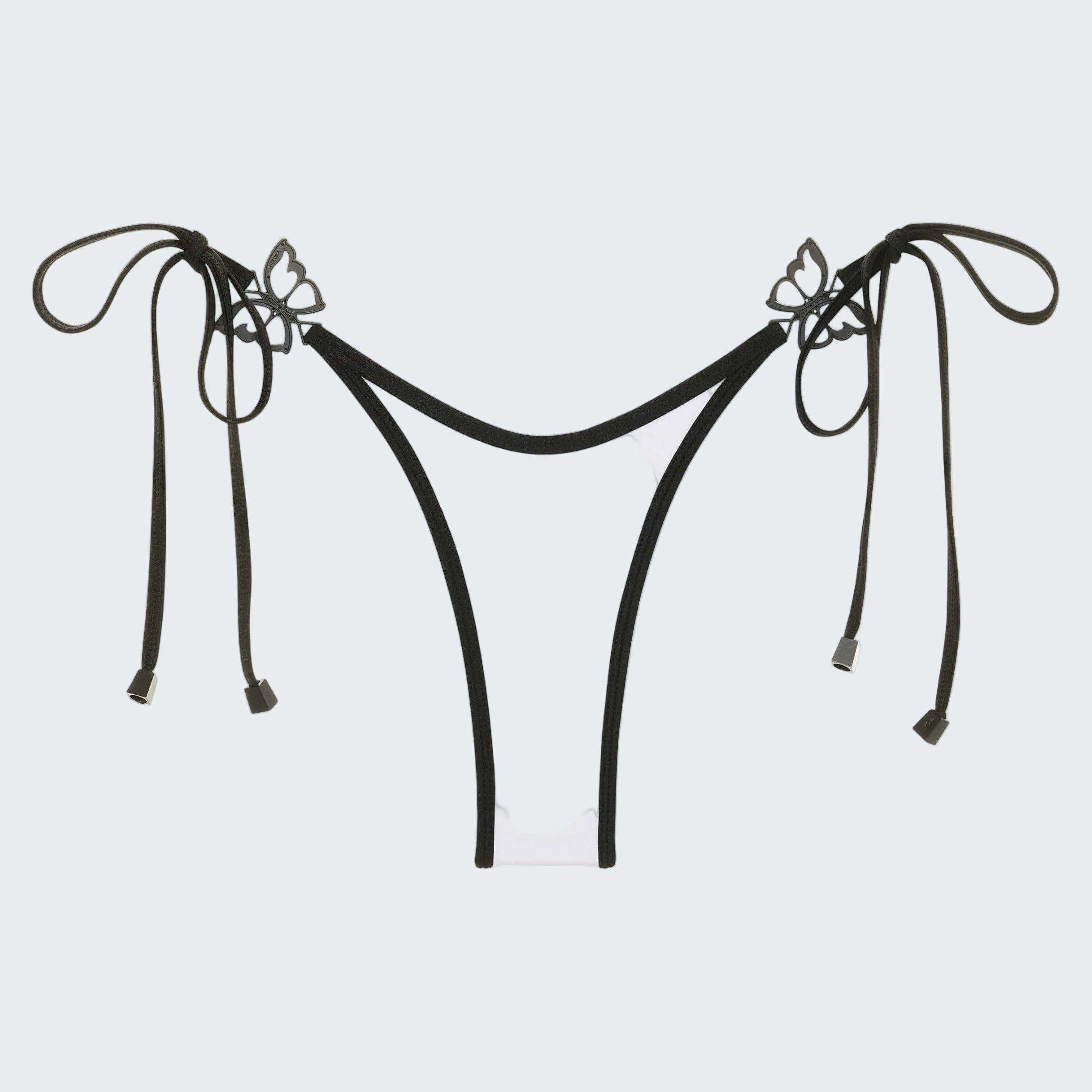 White bikini bottom with black straps and bows on a white background