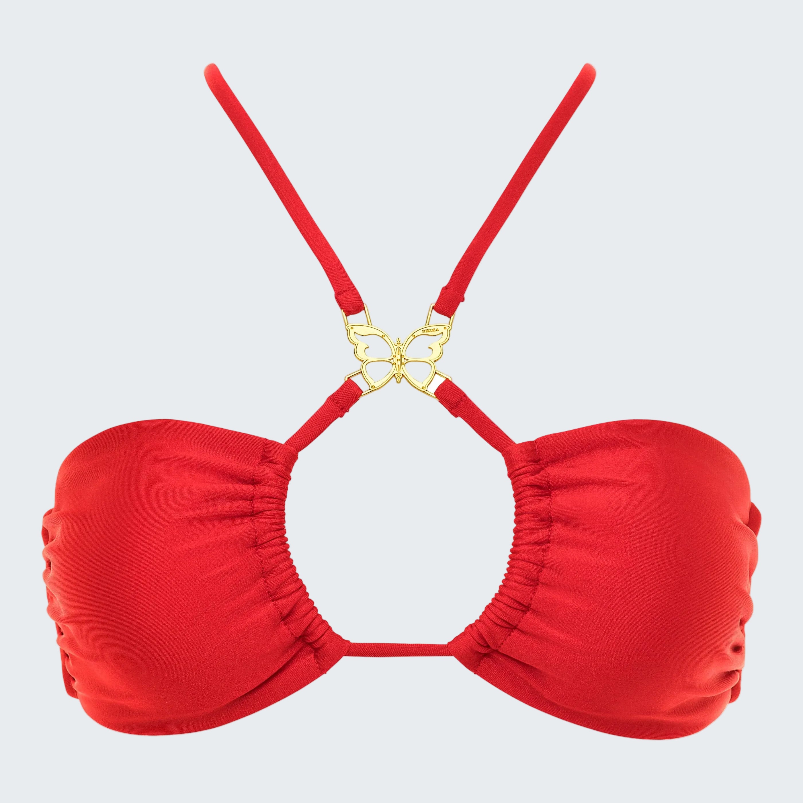 Red bikini top with gold clasp on a white background
