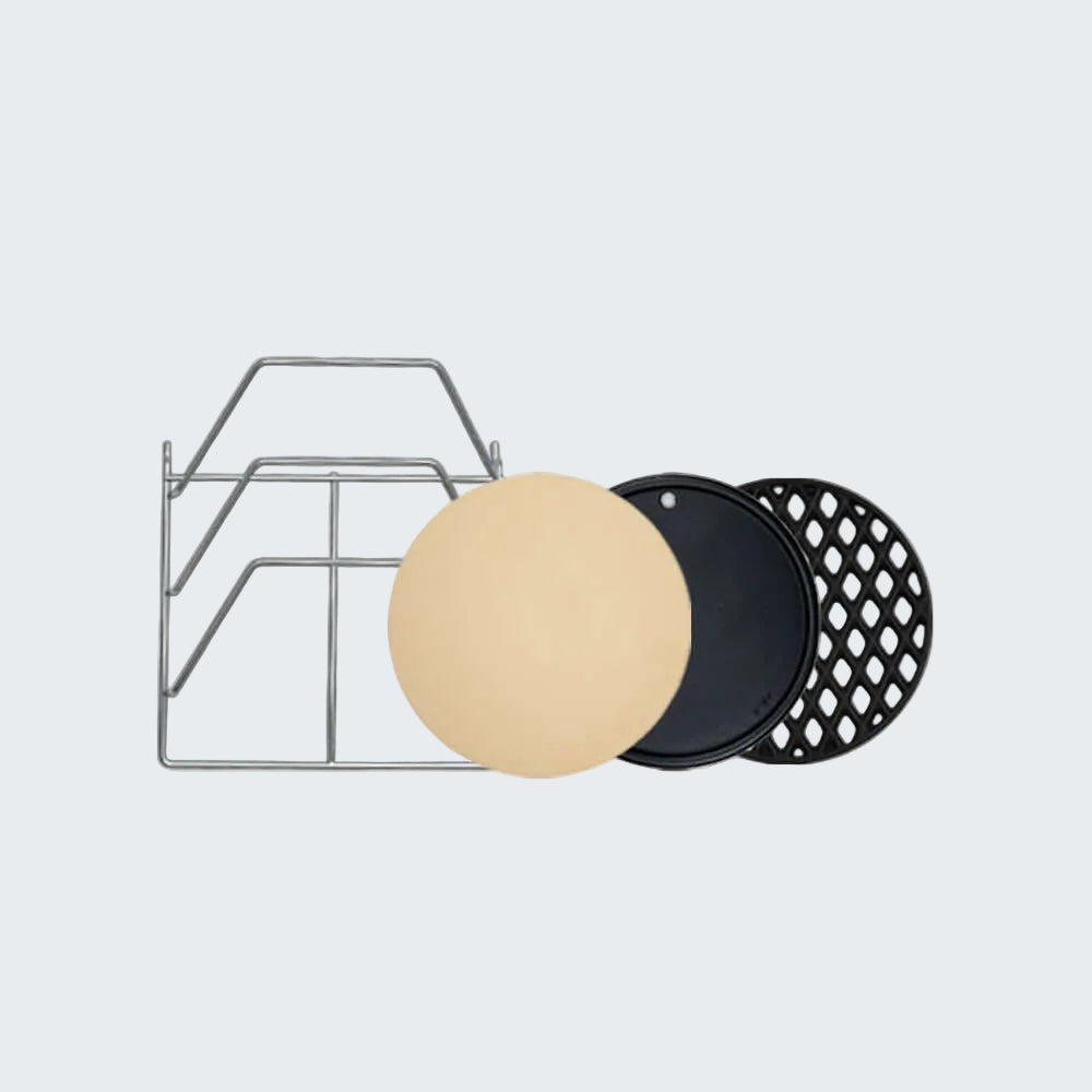 Set of round baking mats with a metal rack on a white background