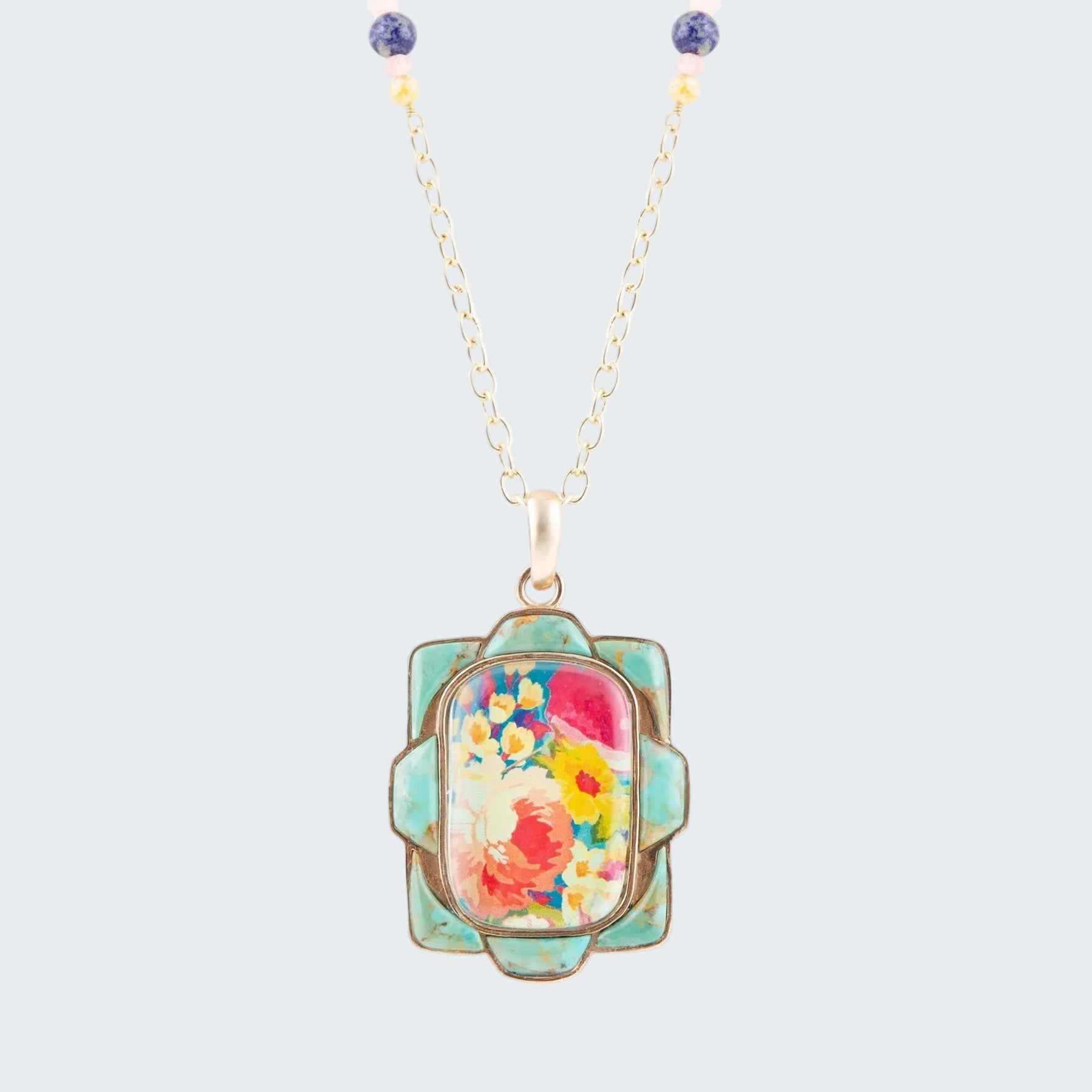 Necklace with a floral pendant on a white background