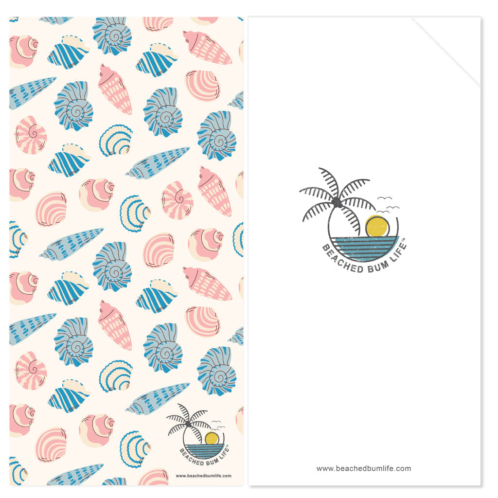 Patterned paper with seashell design and 'Beached Bum Life' logo on a white background