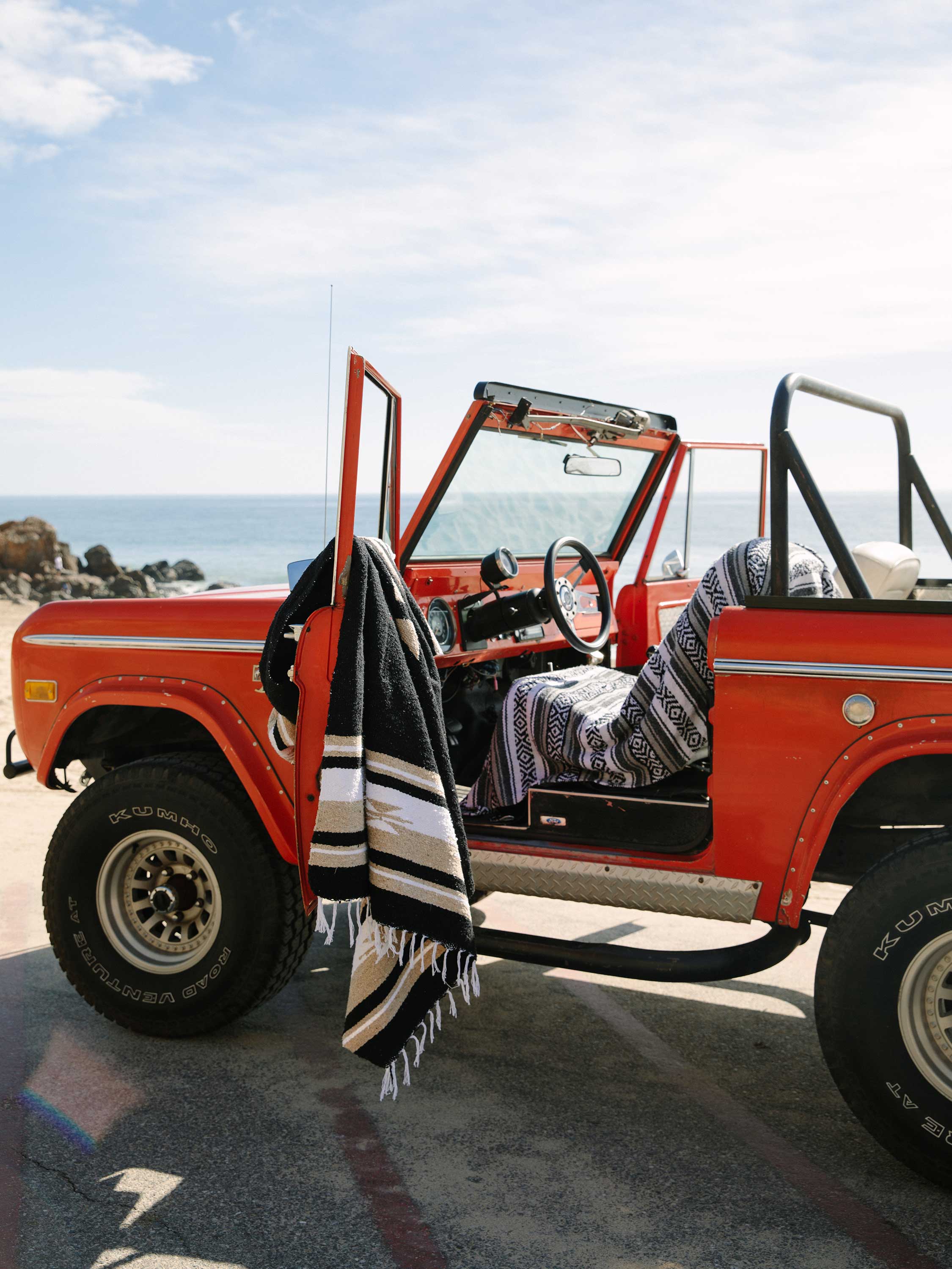 Laguna Beach Textile Company Black Baja Mexican Blanket — trending styles and innovations in vacation clothing at Sun of the Beach Boutique