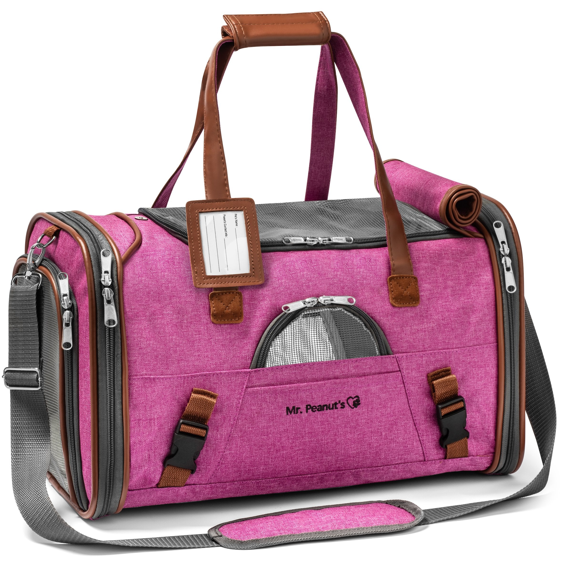 Pink pet carrier with brown straps on a white background