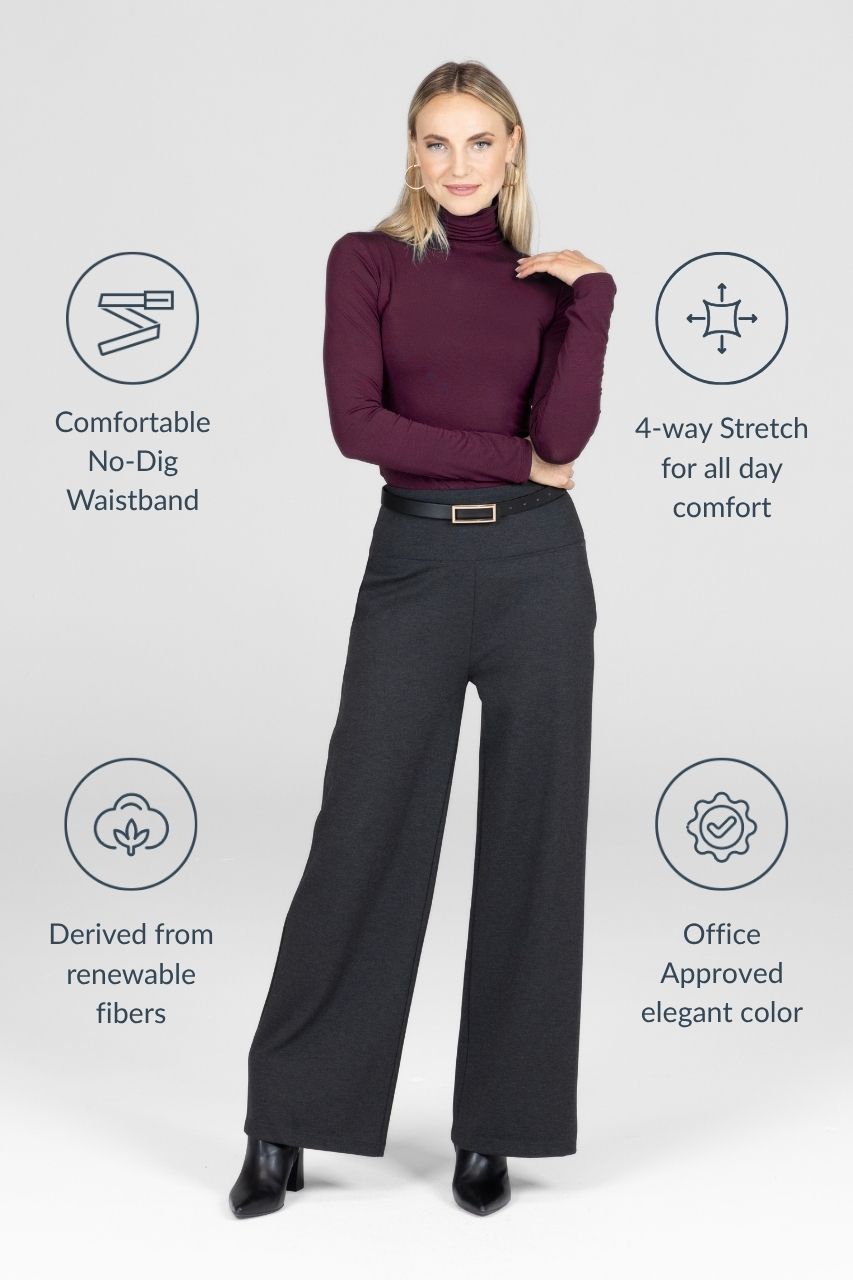 Woman wearing a dark purple turtleneck and black pants with text highlighting features on a light gray background