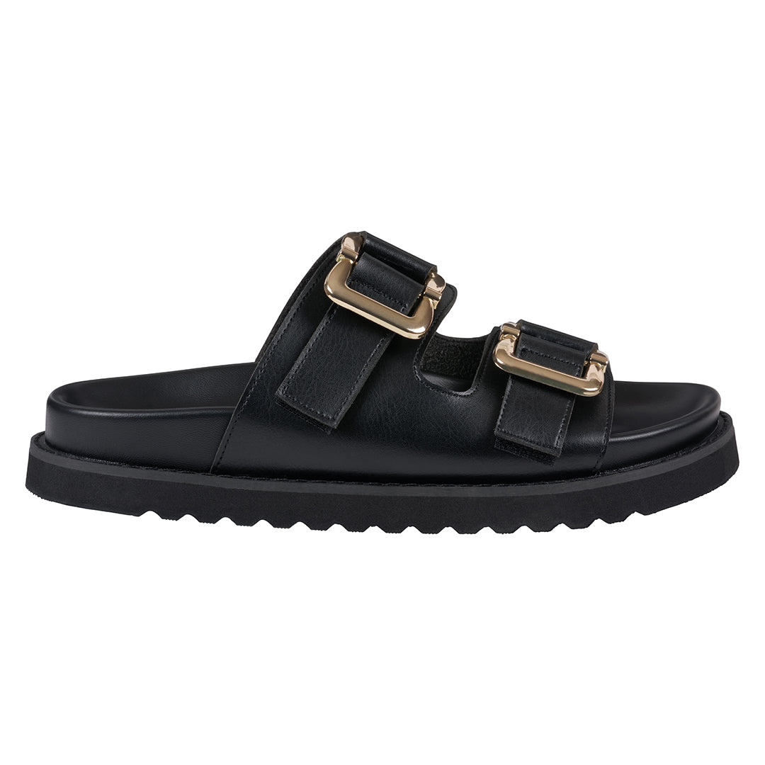 Black sandal with gold buckles on a white background