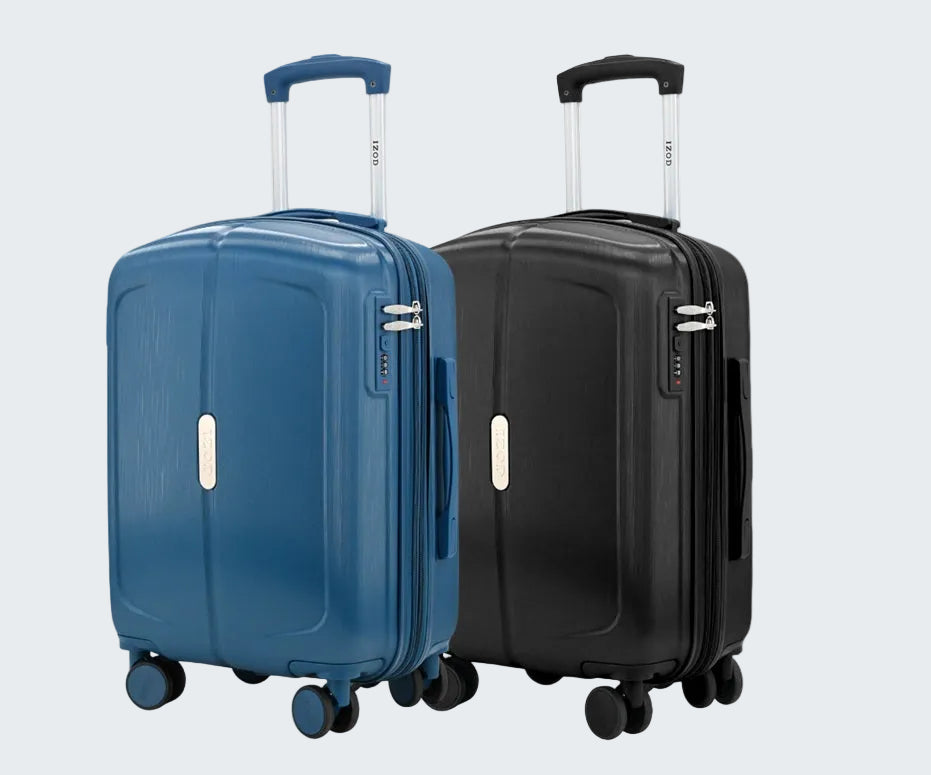 Two suitcases, one blue and one black, on a white background