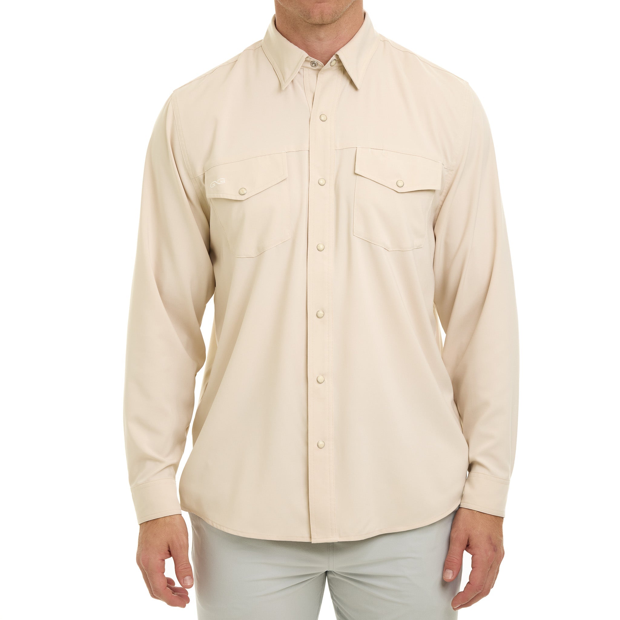 Beige button-up shirt worn by a person on a white background
