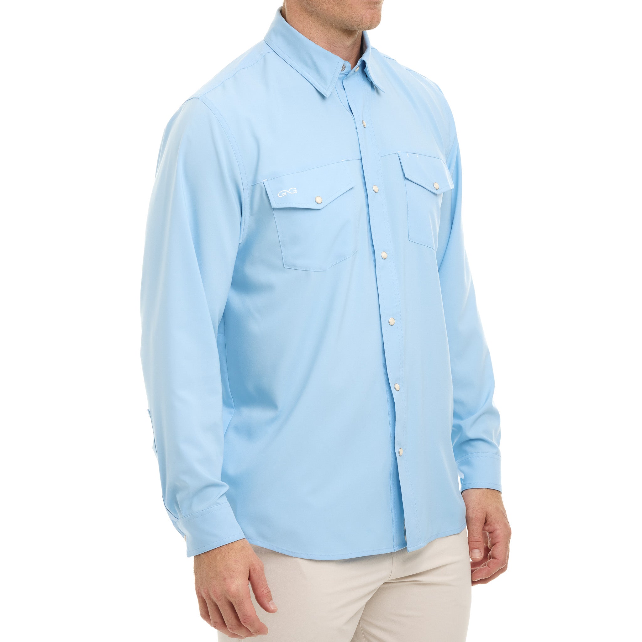 Light blue button-up shirt worn by a person on a white background