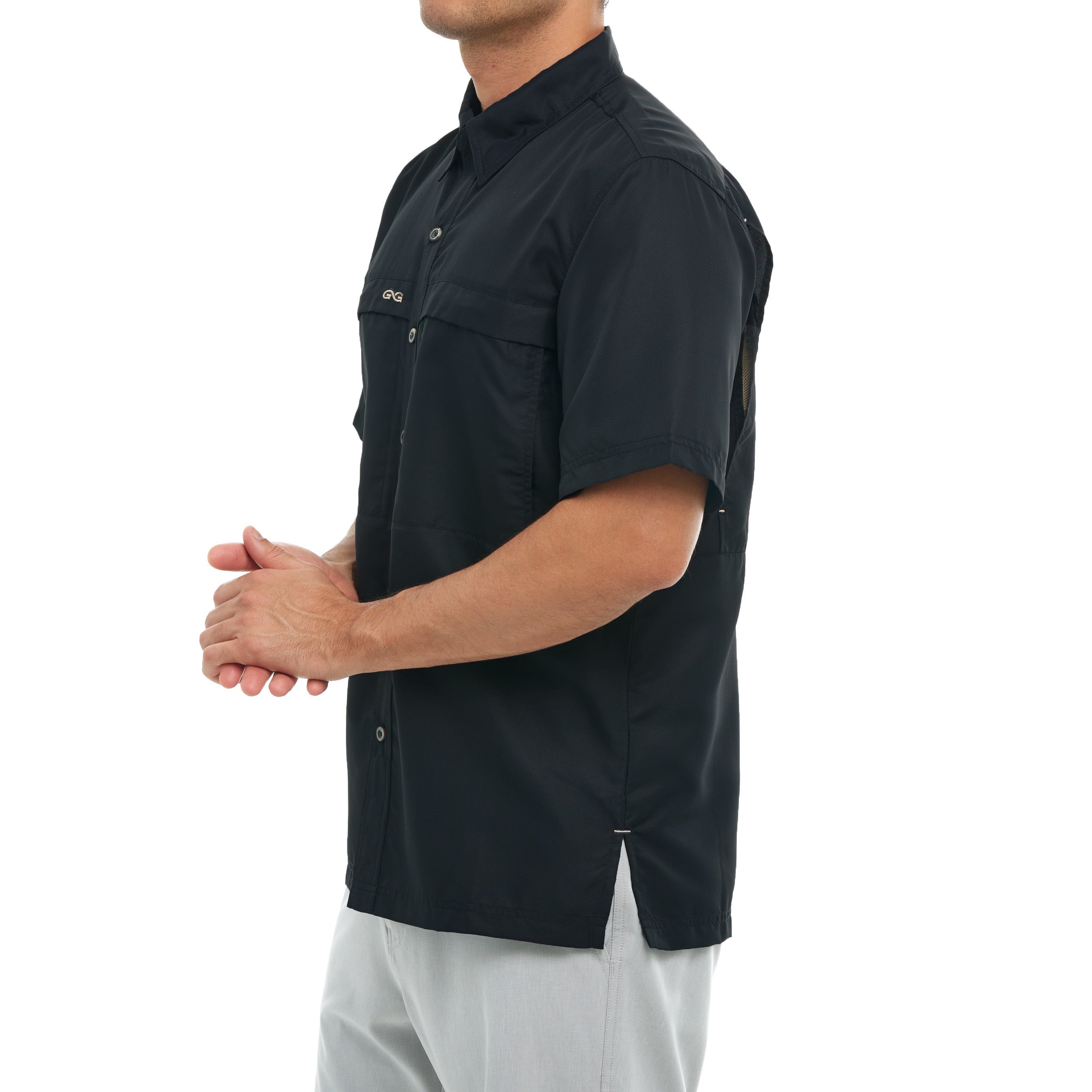 Person wearing a black short-sleeve shirt on a white background