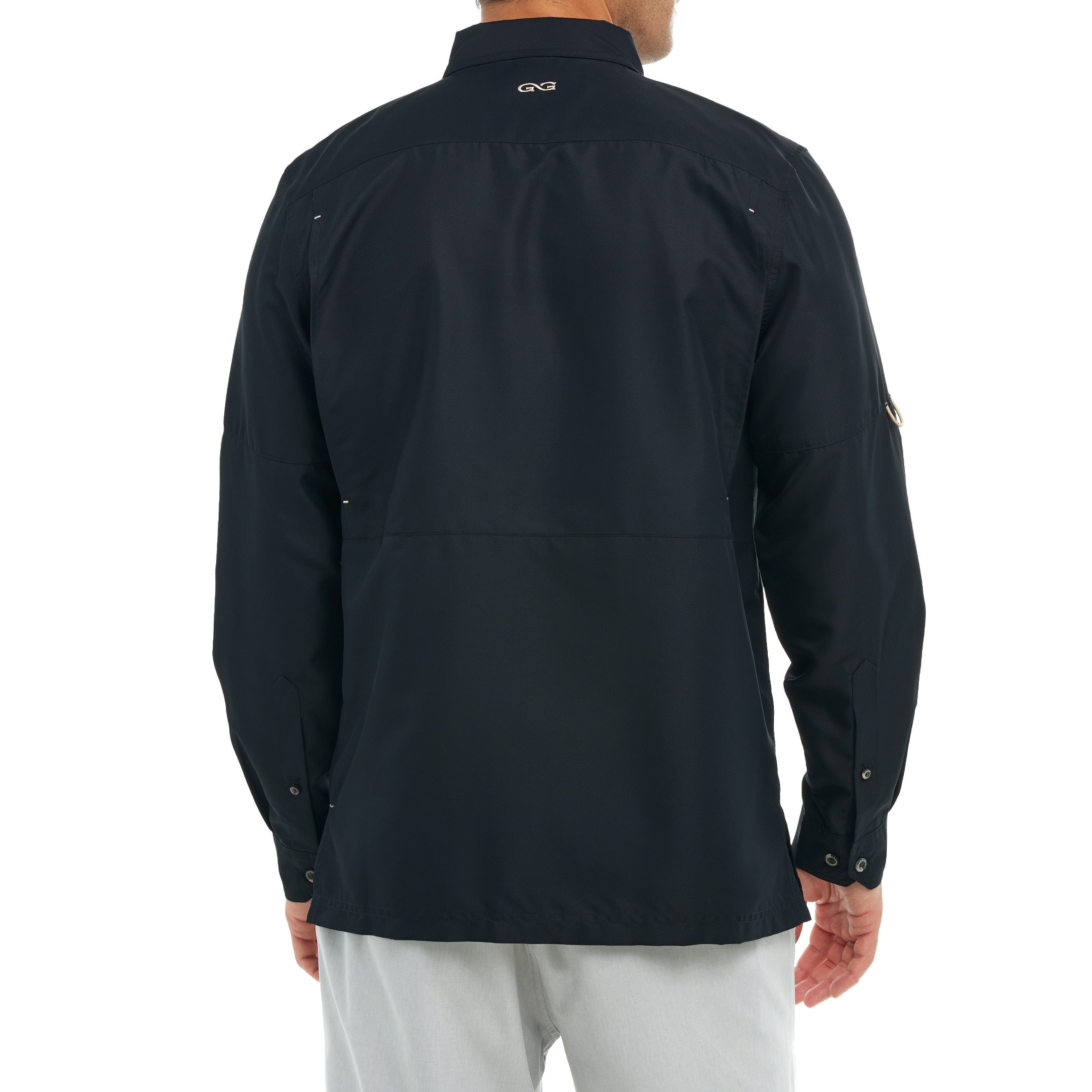 Black long-sleeve shirt worn by a person on a white background
