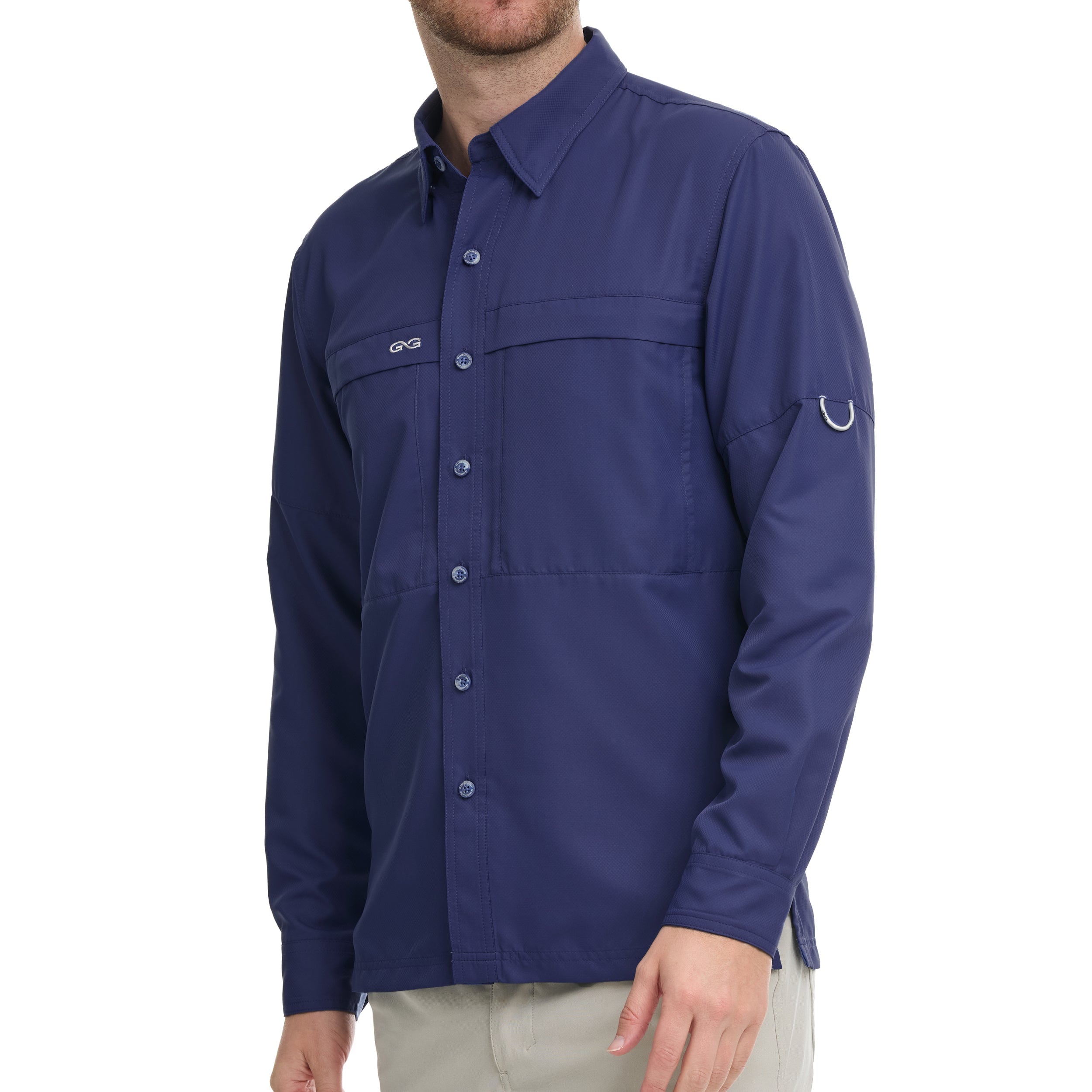 Man wearing a blue shirt with a brand logo on a white background