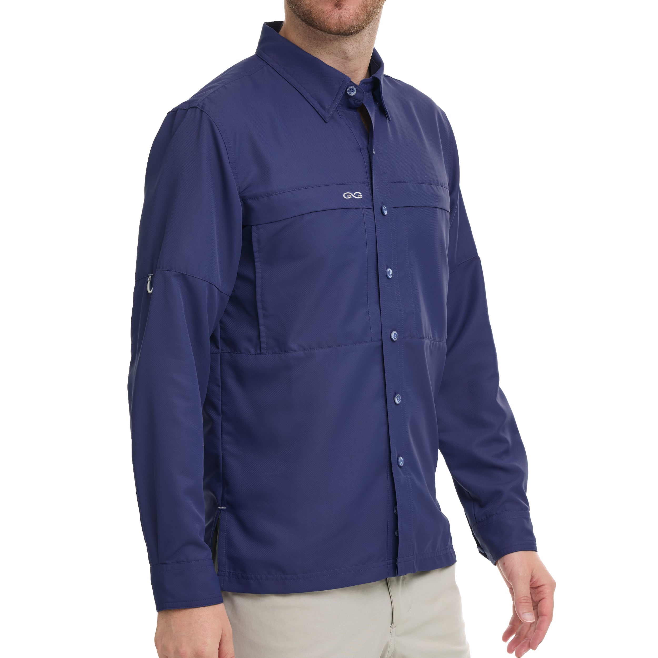 Man wearing a blue shirt with a brand logo on a white background