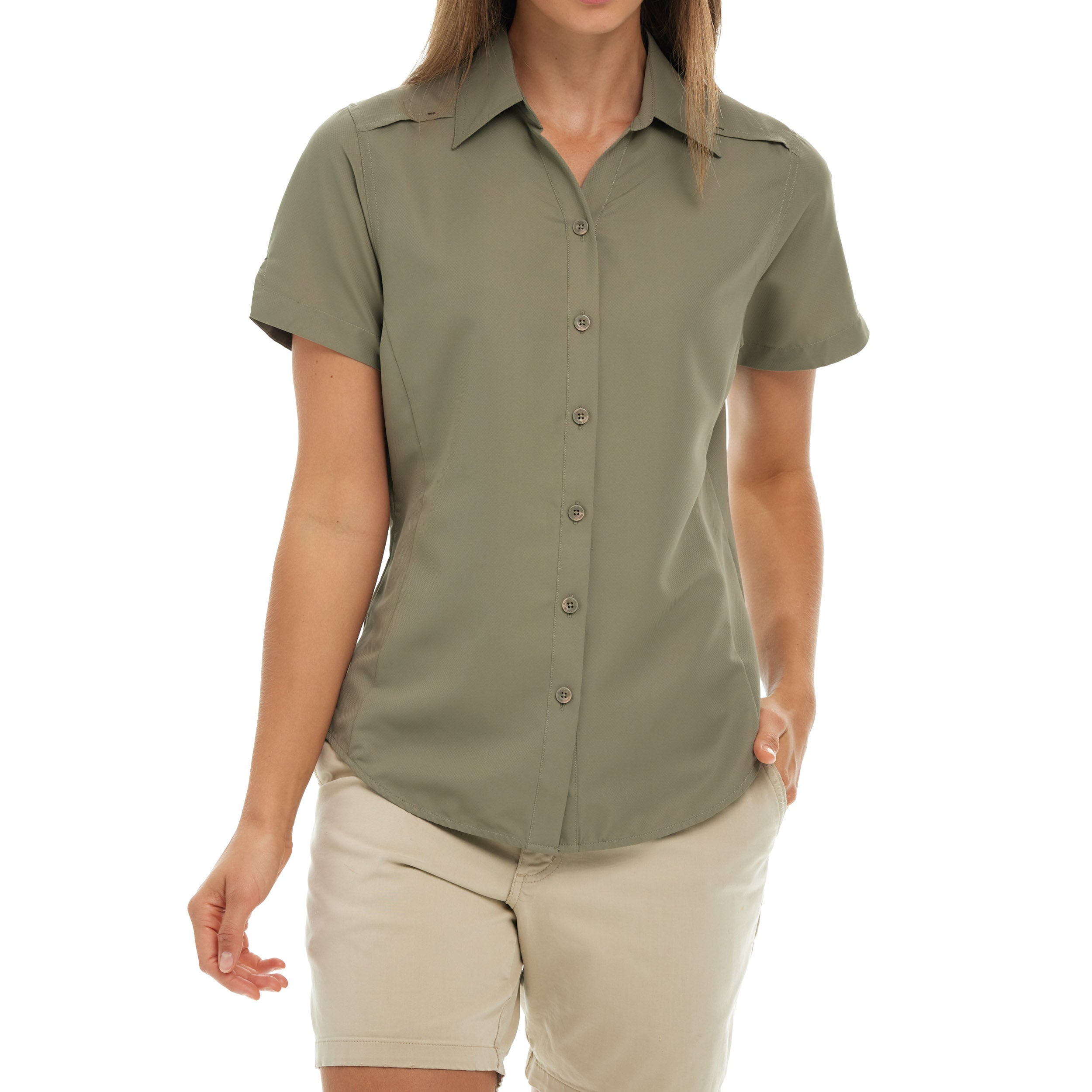 Person wearing a green button-up shirt and beige shorts on a white background