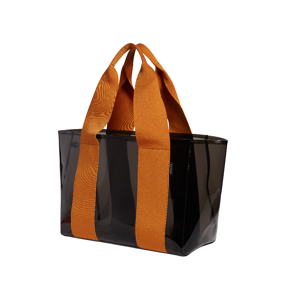 Black tote bag with orange handles on a white background