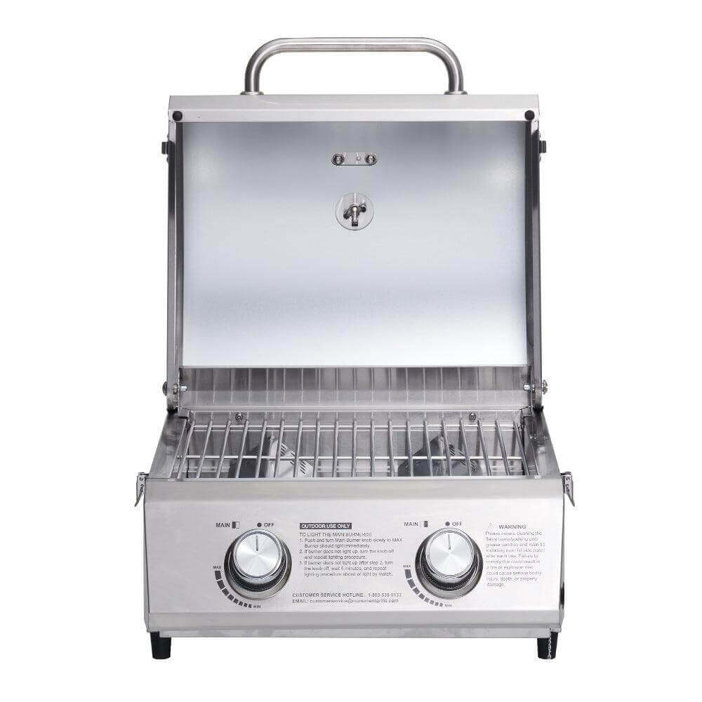 Stainless steel grill with two control knobs on a white background