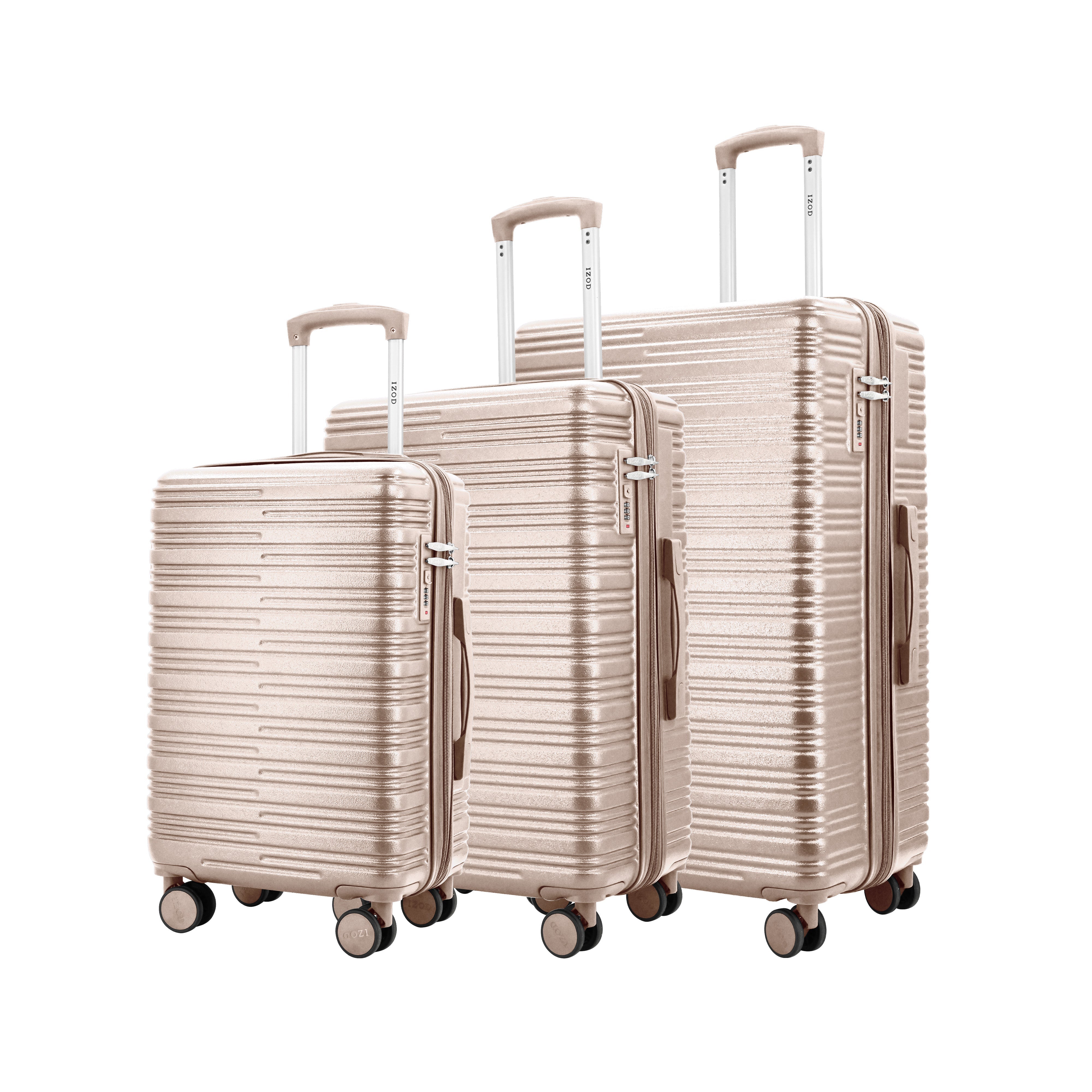 Set of three beige suitcases of different sizes on a white background